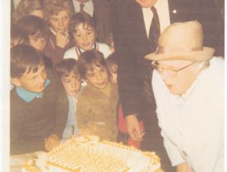 School Centenary 1973; Miss Ringer and Mr Bourton cutting the cake